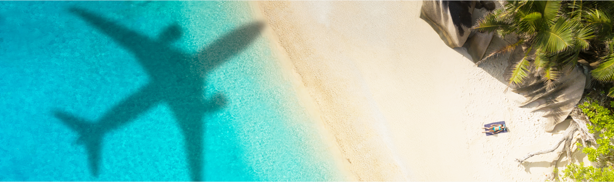 plane flying over an island